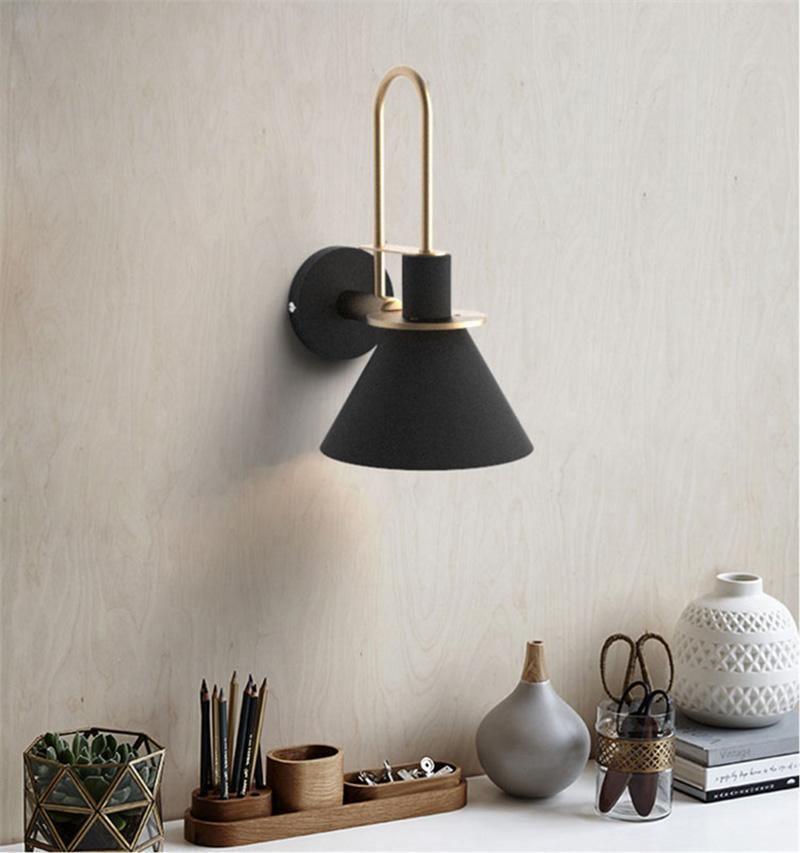 Solerine minimalistisk vägglampa i svart och guld