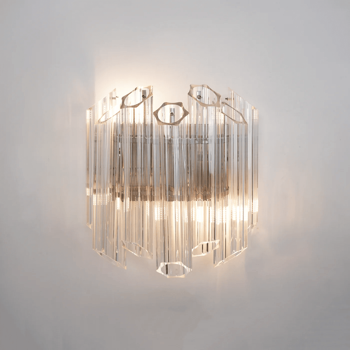 Celalaria vägglampa i klart Murano-glas med rörkaskad