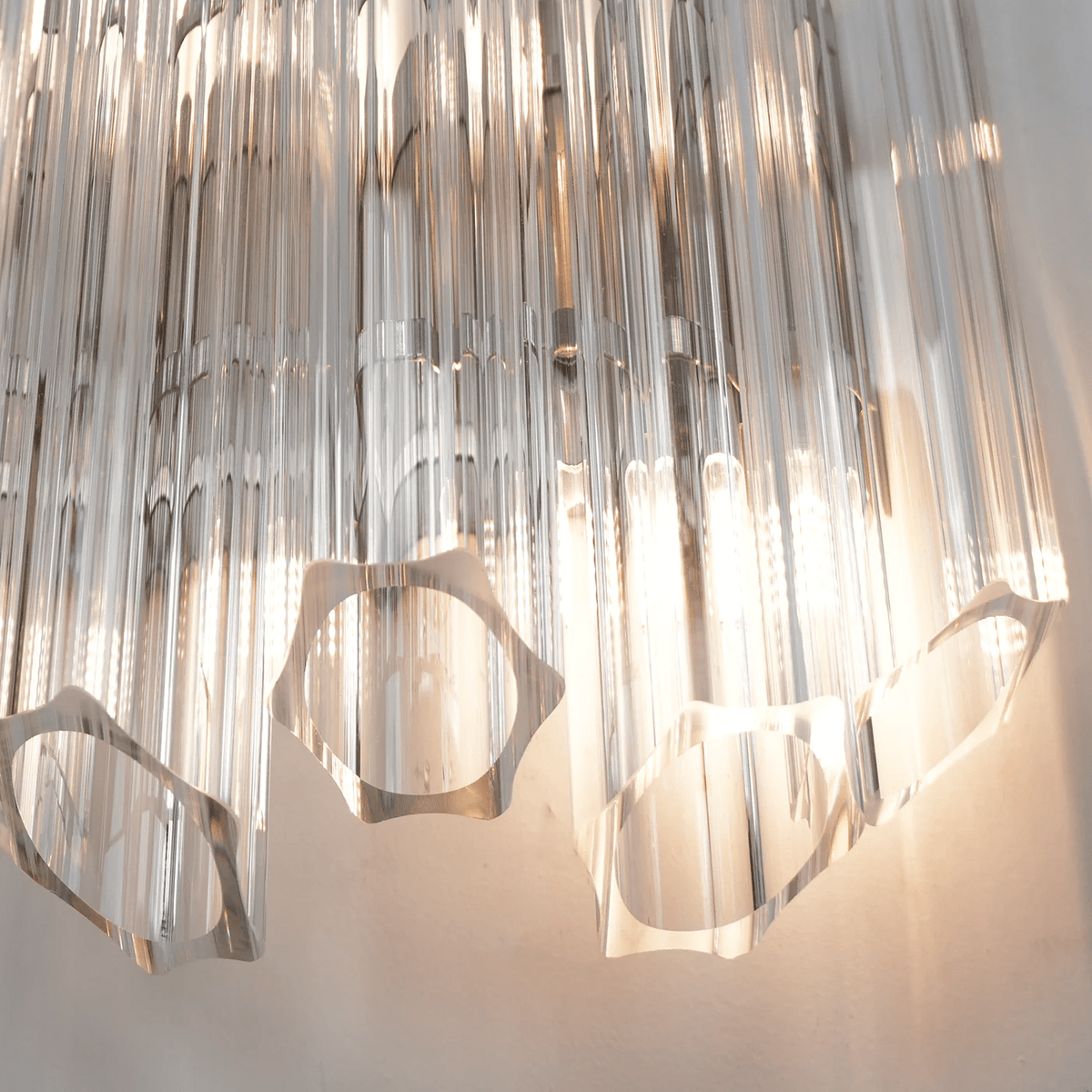 Celalaria vägglampa i klart Murano-glas med rörkaskad