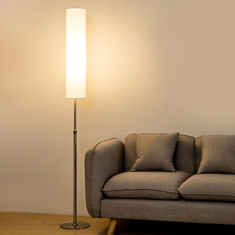Eryn minimalistisk vit cylindrisk golvlampa i metall och tyg