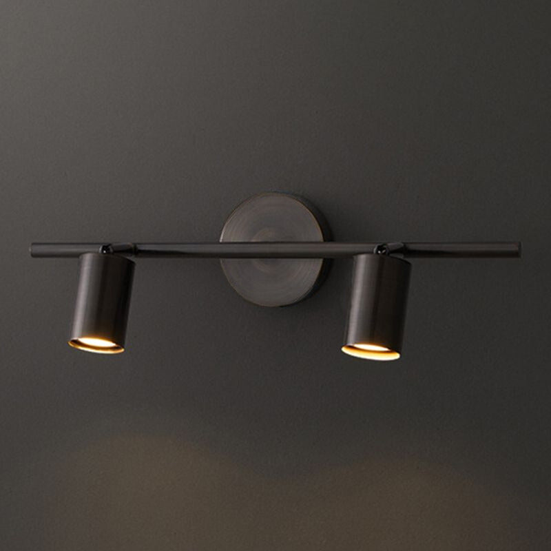 Griv modern roterbar spotlight i cylindrisk form, vägglampa i mässing