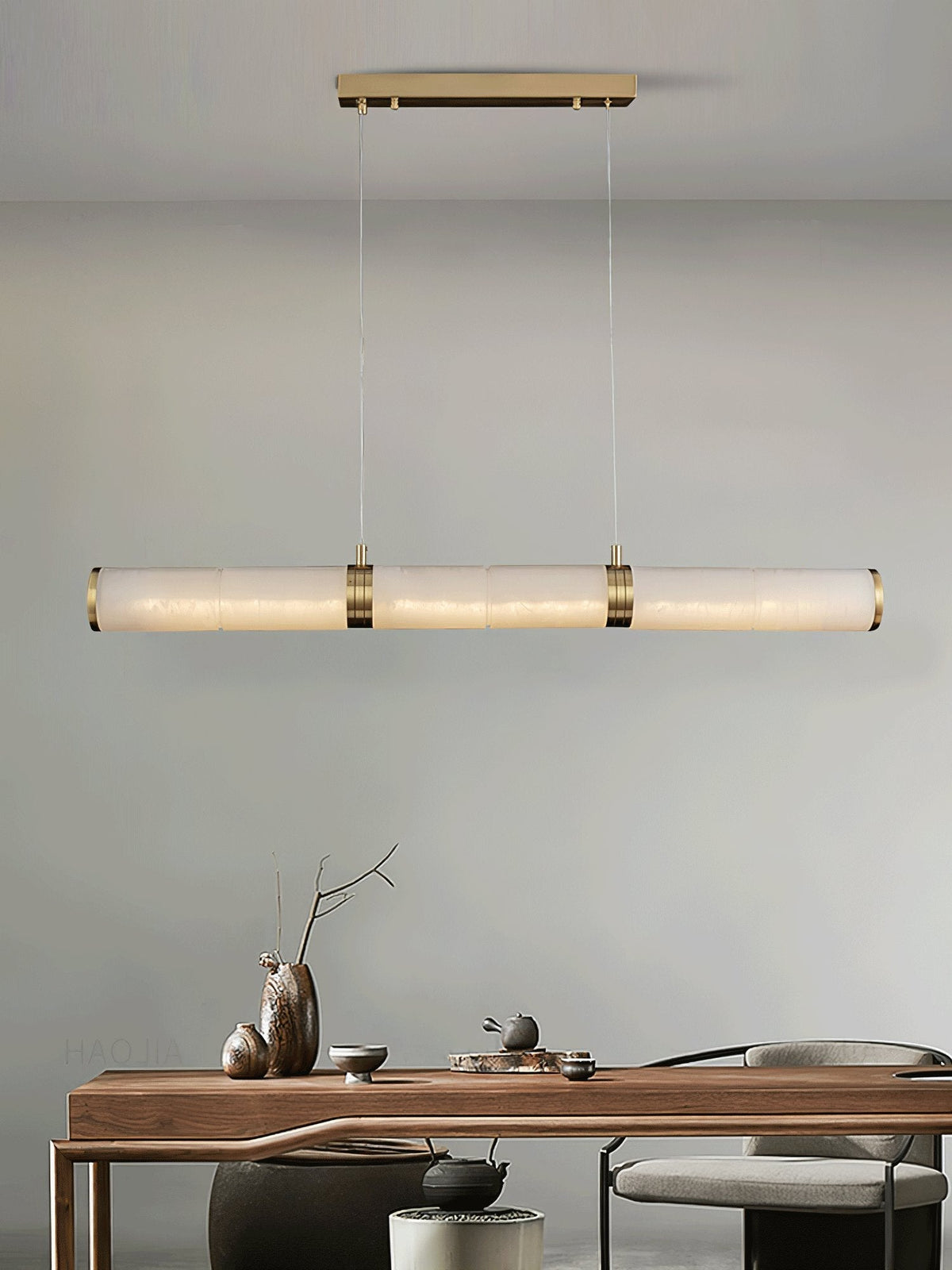 Gevrel minimalistisk linjär pendellampa i alabaster