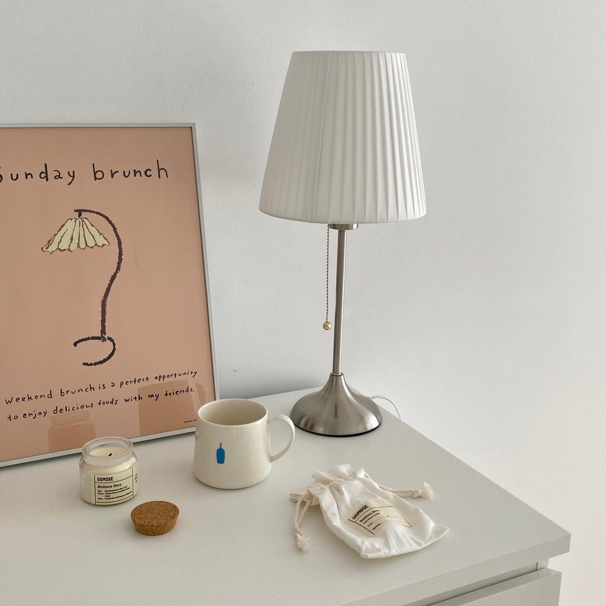 Simplicity plisseret bordlampe i stof