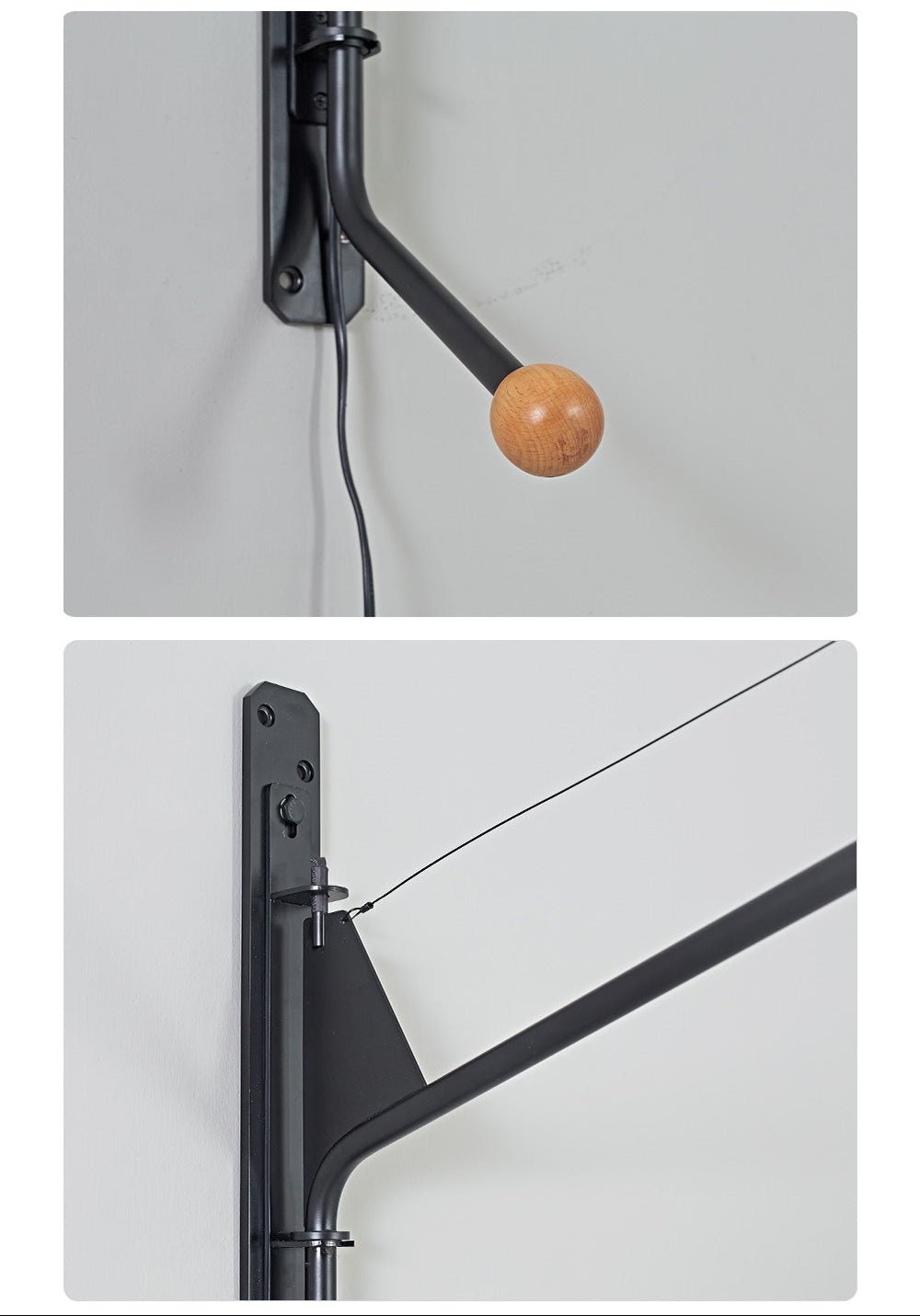 Svart vägglampa med förlängd arm