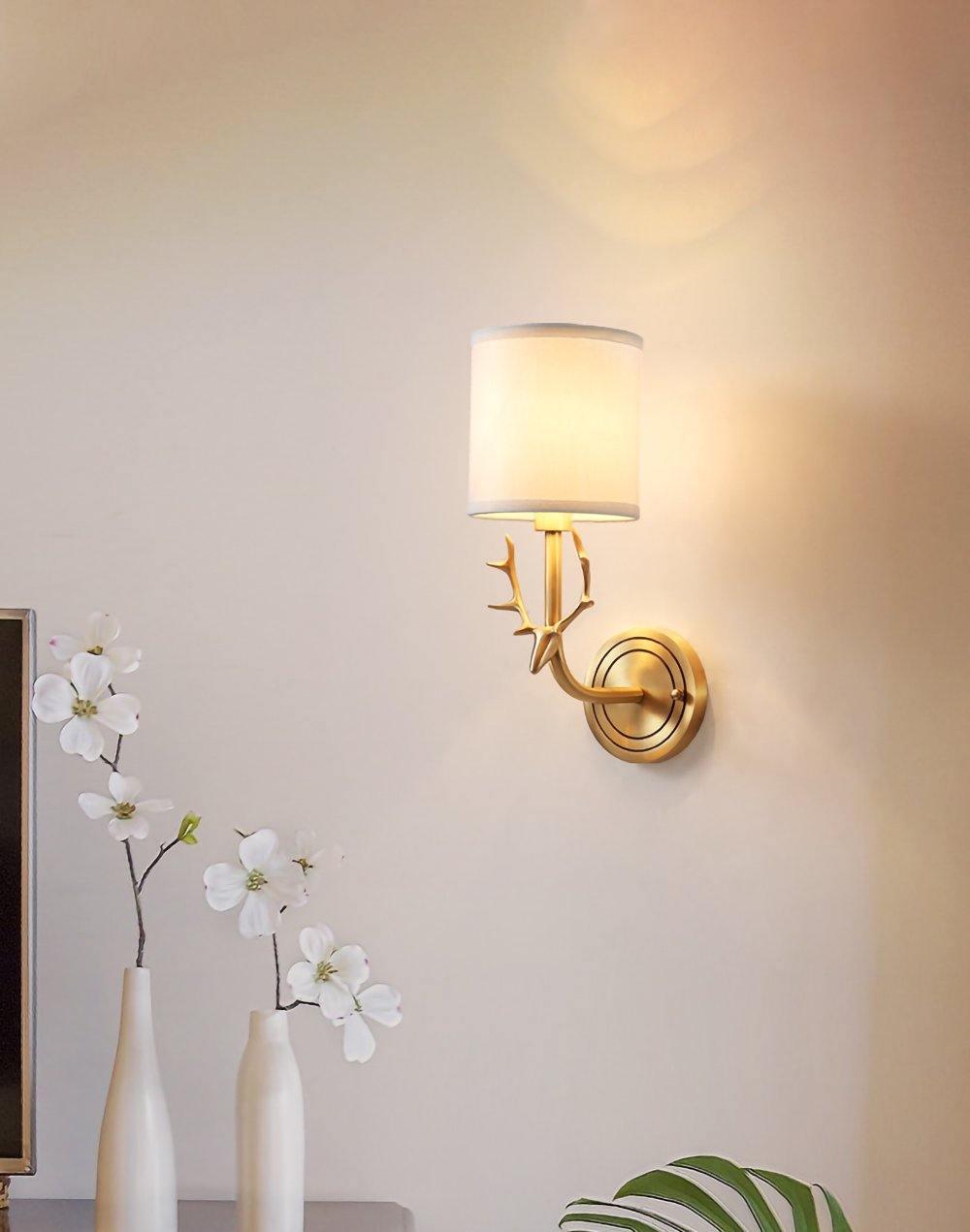 Auriviella elegant vägglampa i mässing med hjorthuvud