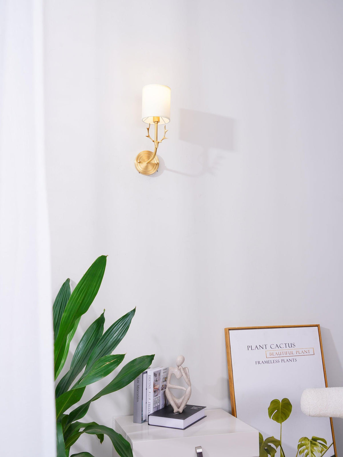 Auriviella elegant vägglampa i mässing med hjorthuvud