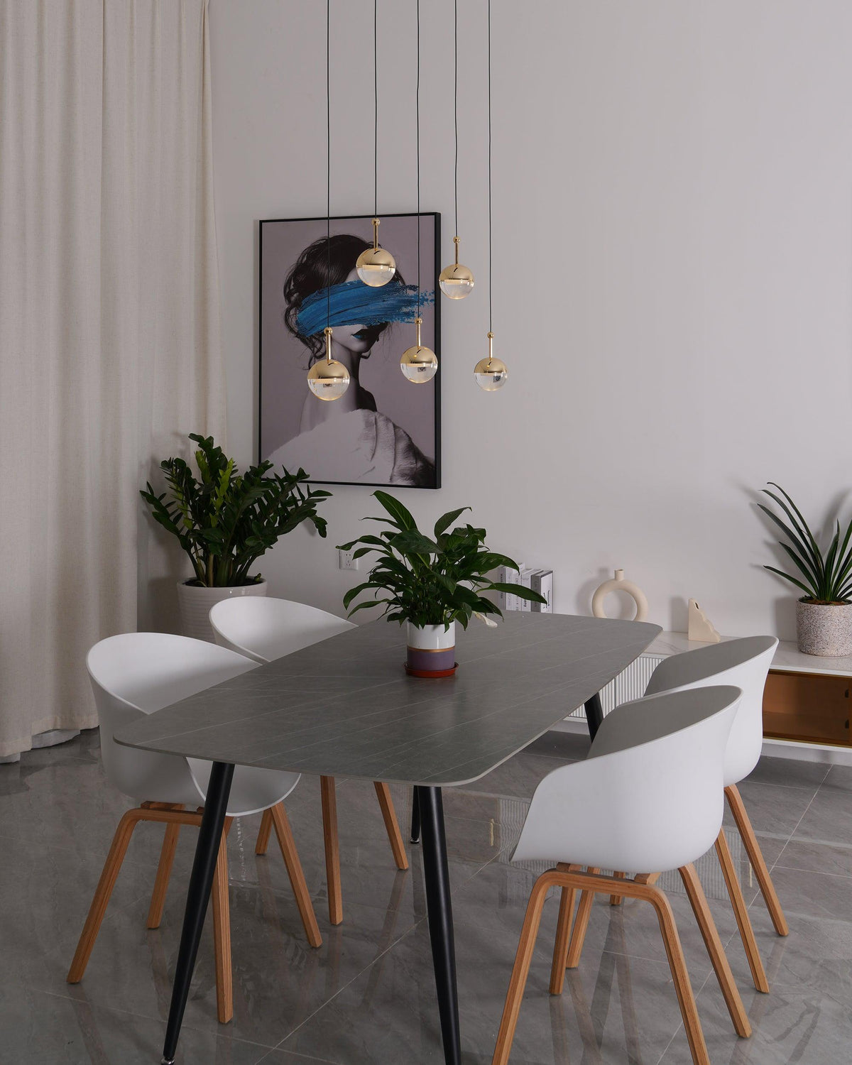 Zaneth minimalistisk pendellampe i stål og glas med flere ophæng til trappe