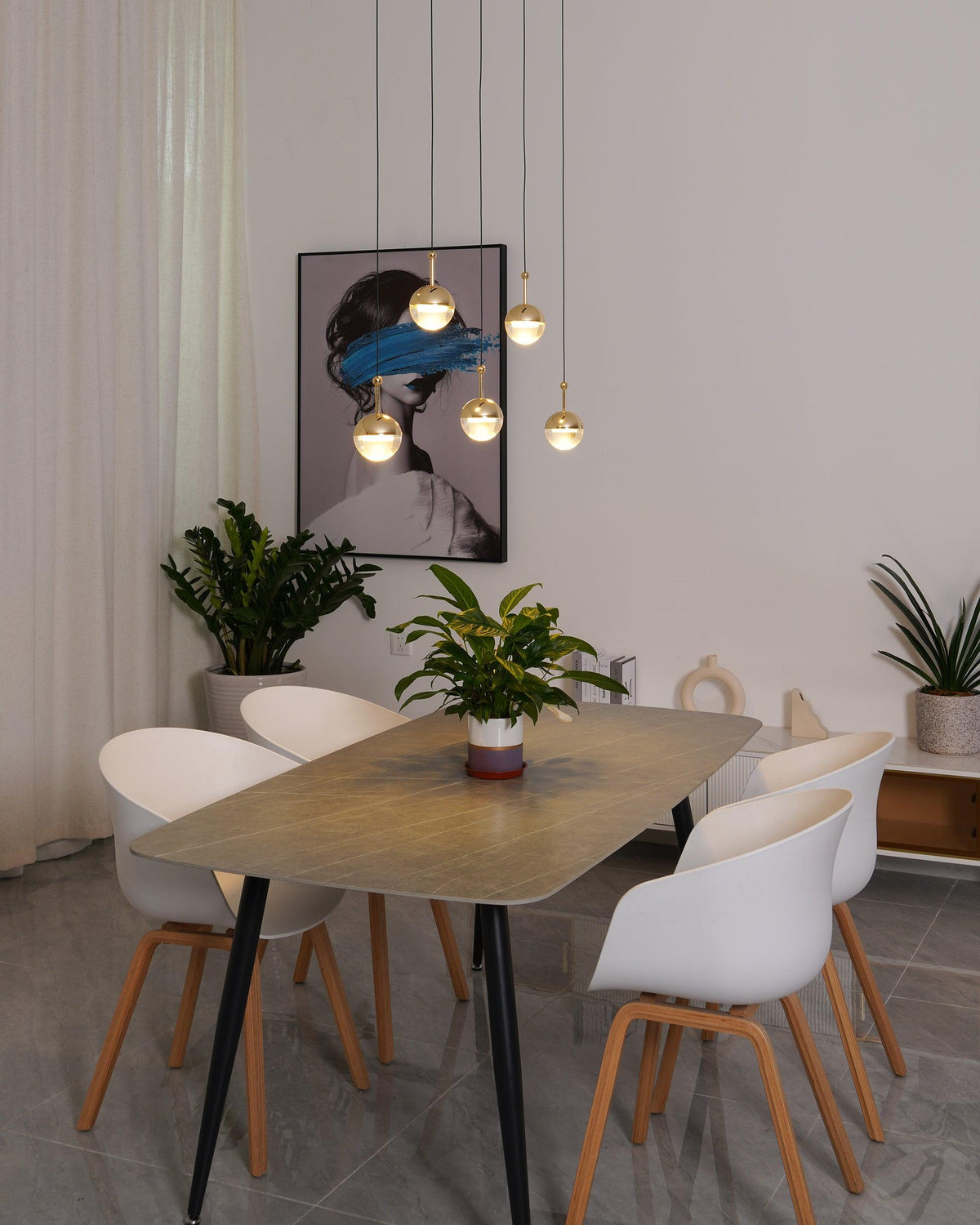 Zaneth minimalistisk pendellampe i stål og glas med flere ophæng til trappe