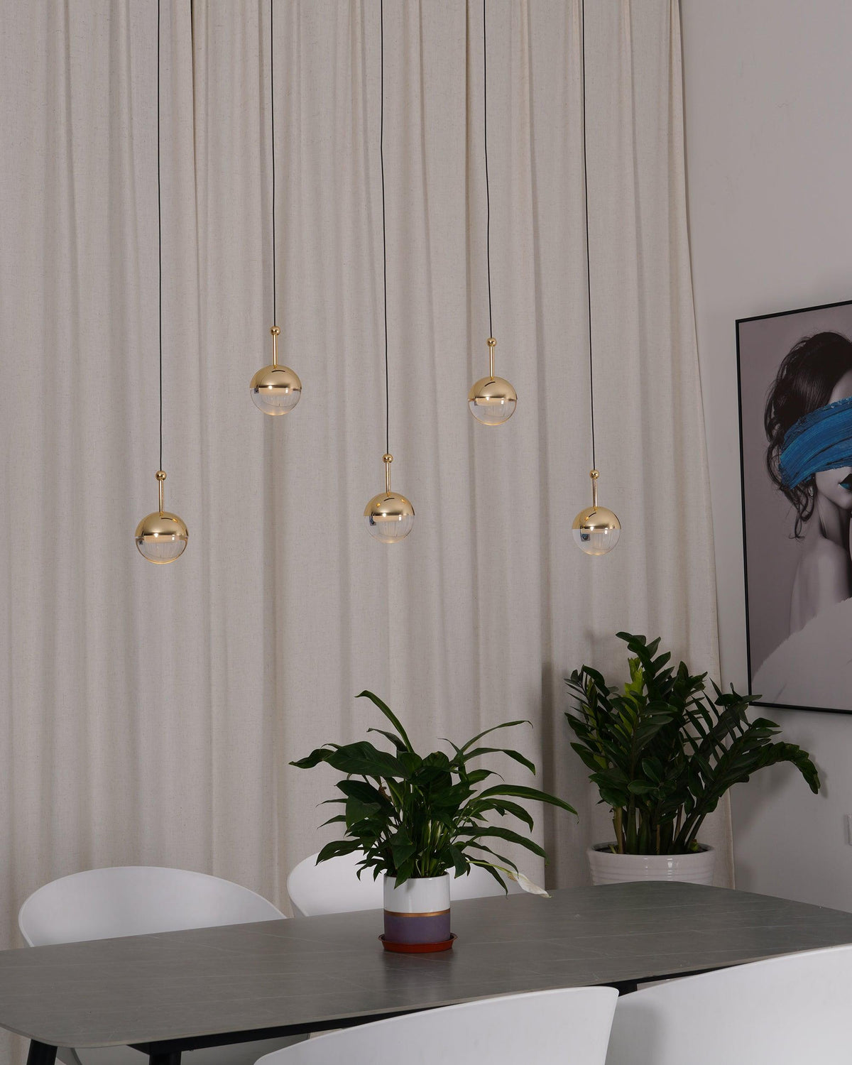 Zaneth minimalistisk pendellampe i stål og glas med flere ophæng til trappe