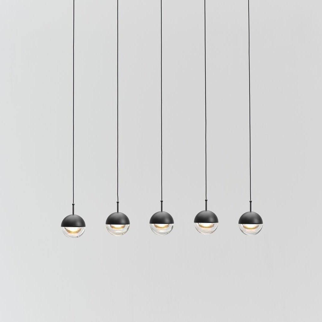 Zaneth minimalistisk pendellampe i stål og glas med flere ophæng til trappe