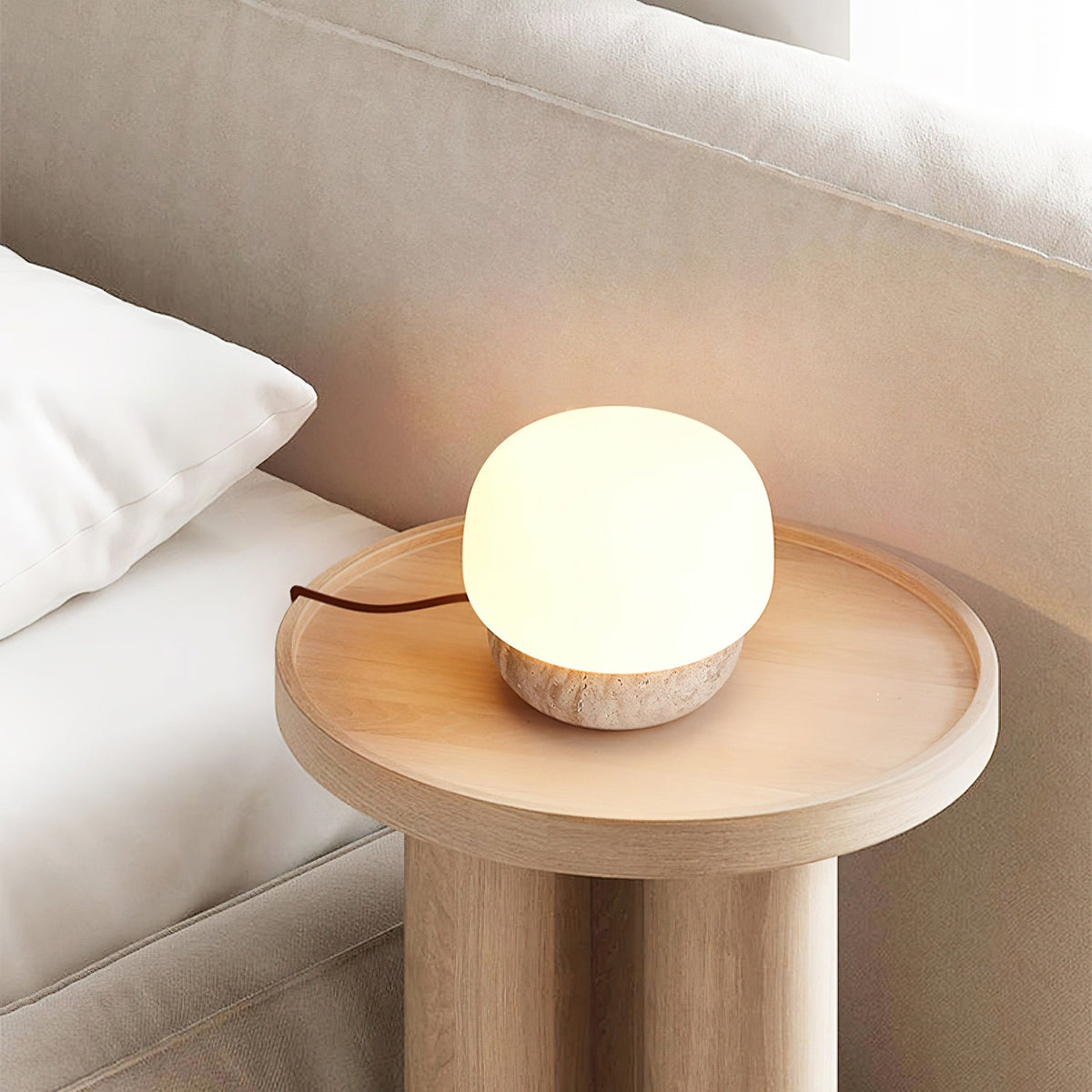Candeeiro de mesa Eldoreth com base em cúpula de travertino