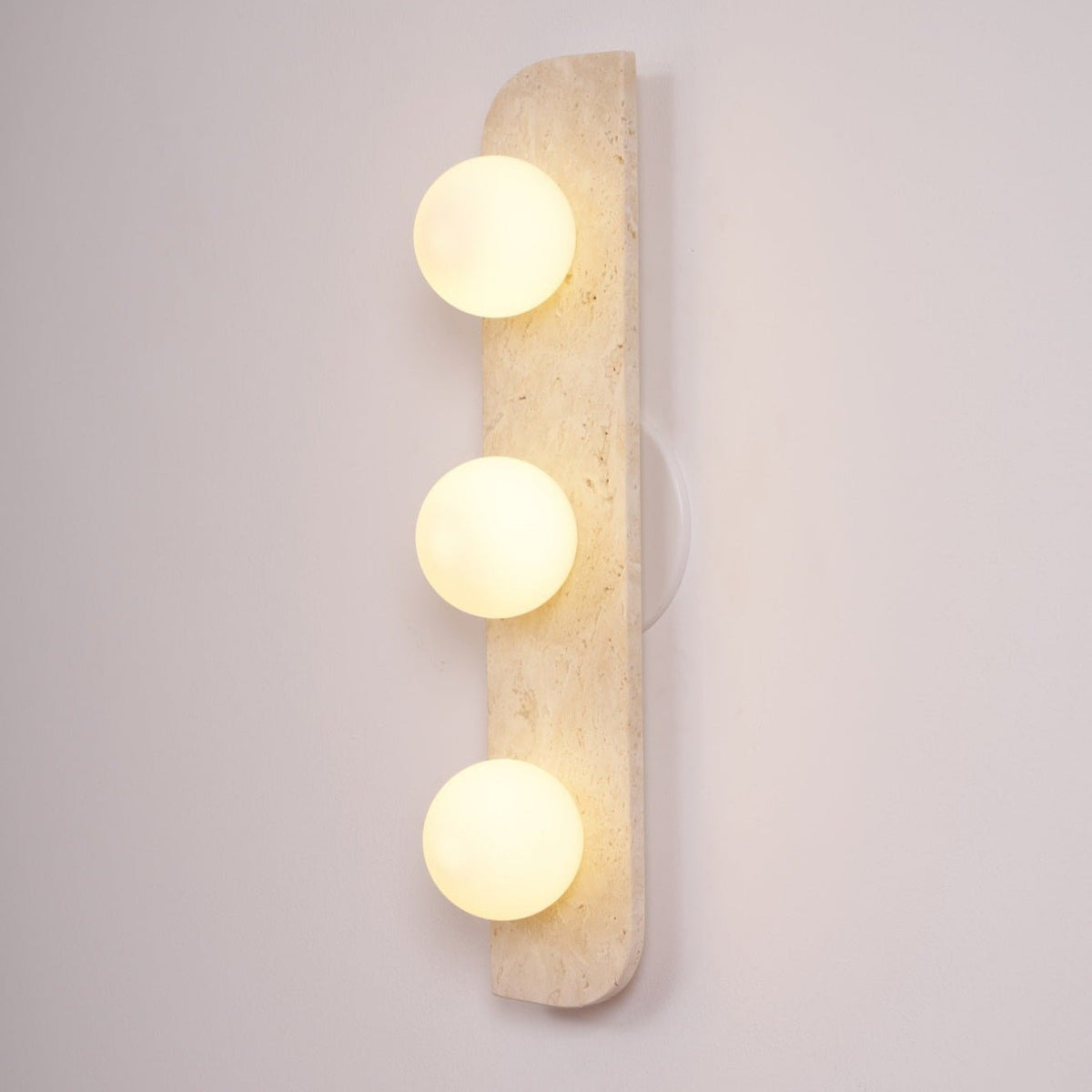 Taviniella minimalistisk vägglampa i travertin