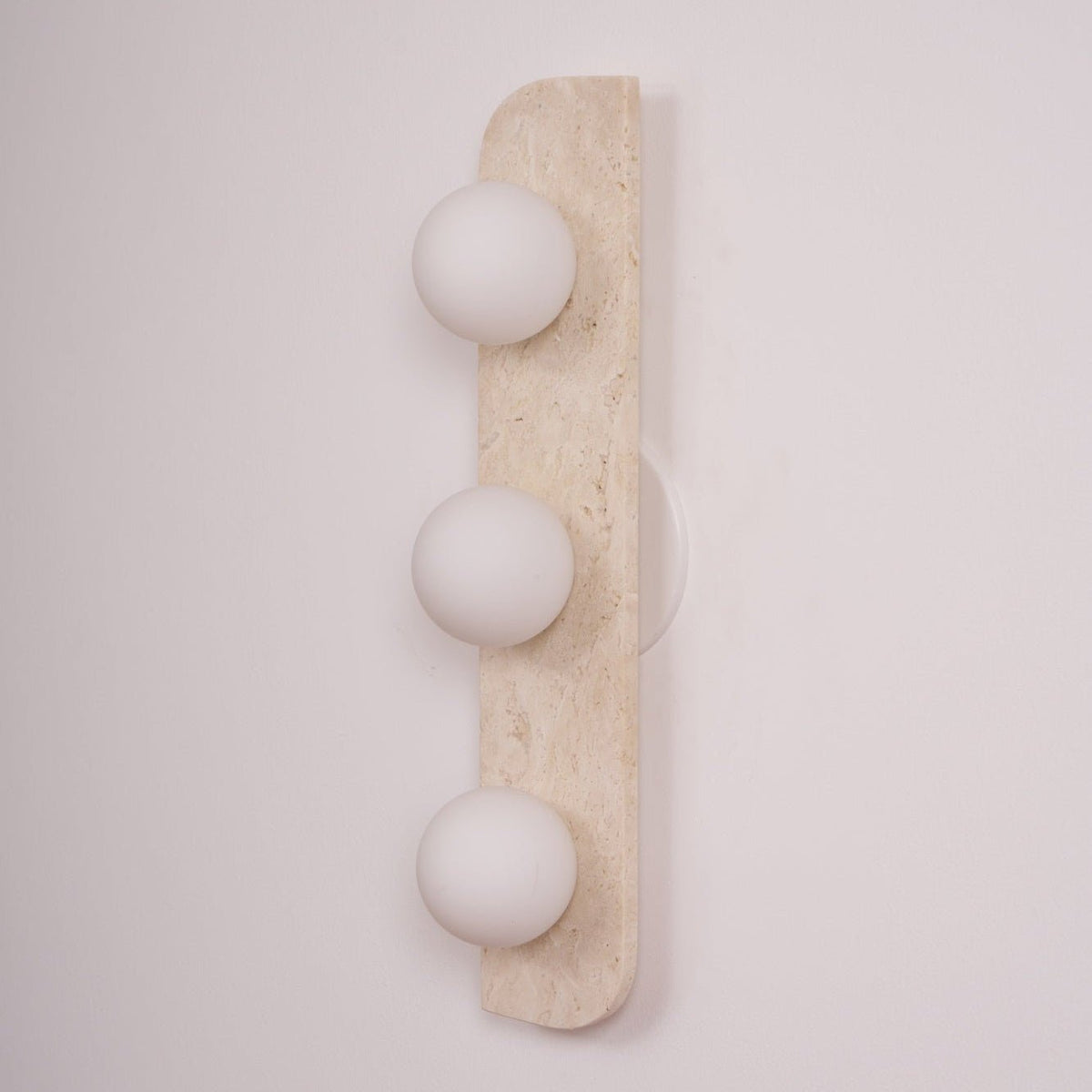 Taviniella minimalistisk vägglampa i travertin
