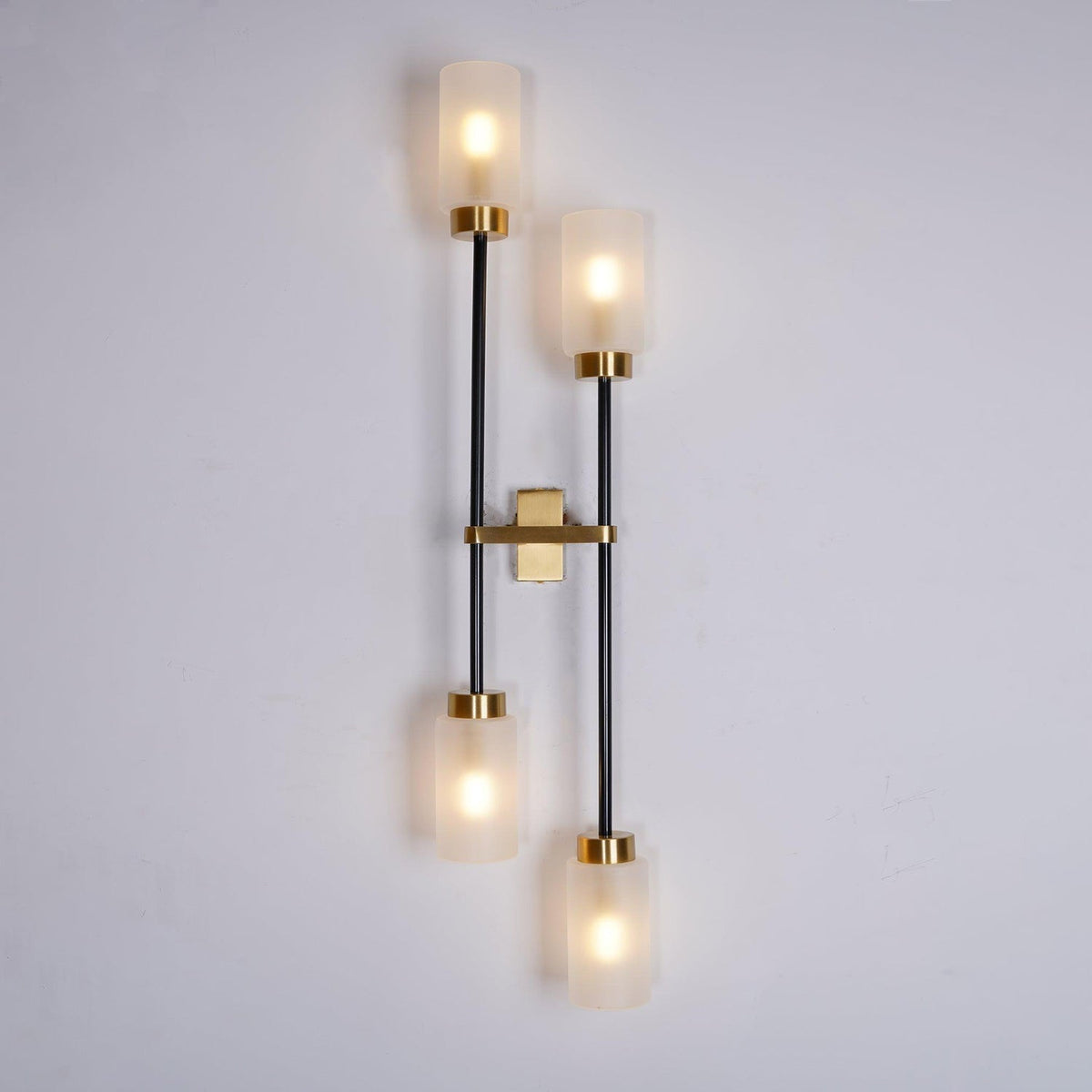 Tekas linjär vägglampa med cylindrar i glas