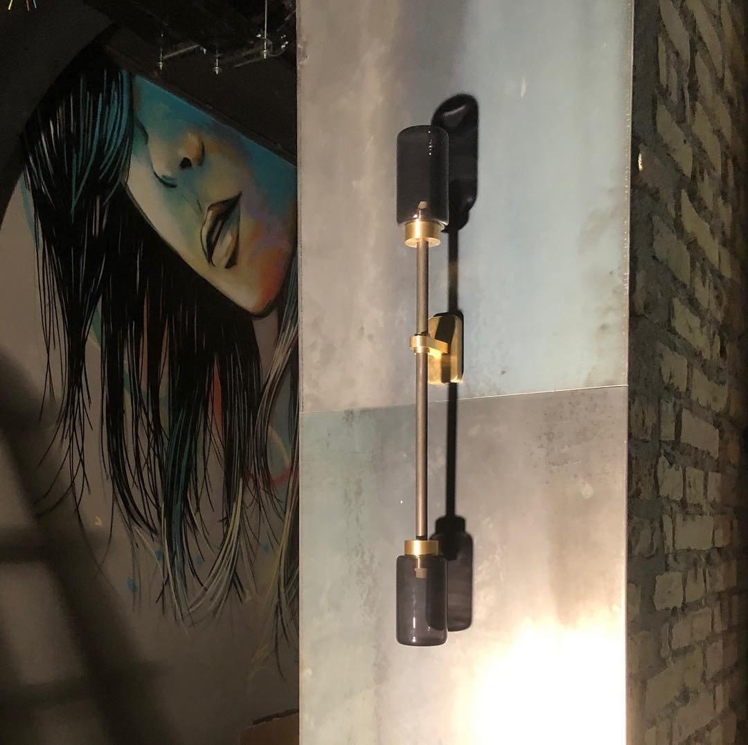Tekas linjär vägglampa med cylindrar i glas