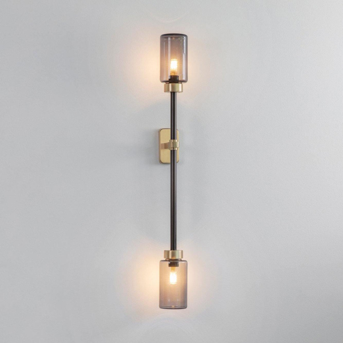 Tekas linjär vägglampa med cylindrar i glas