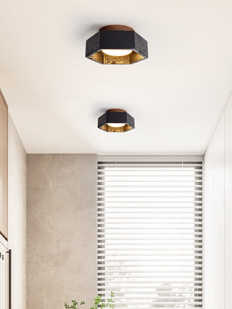 Hexara hexagonal taklampa i svart travertin