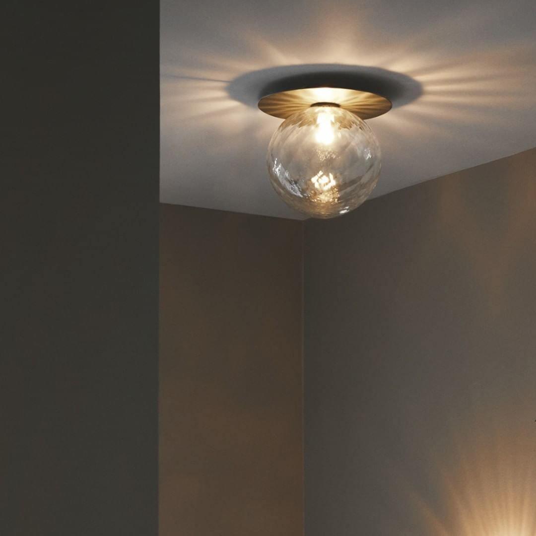 Candeeiro de parede minimalista Nifte em forma de disco e globo