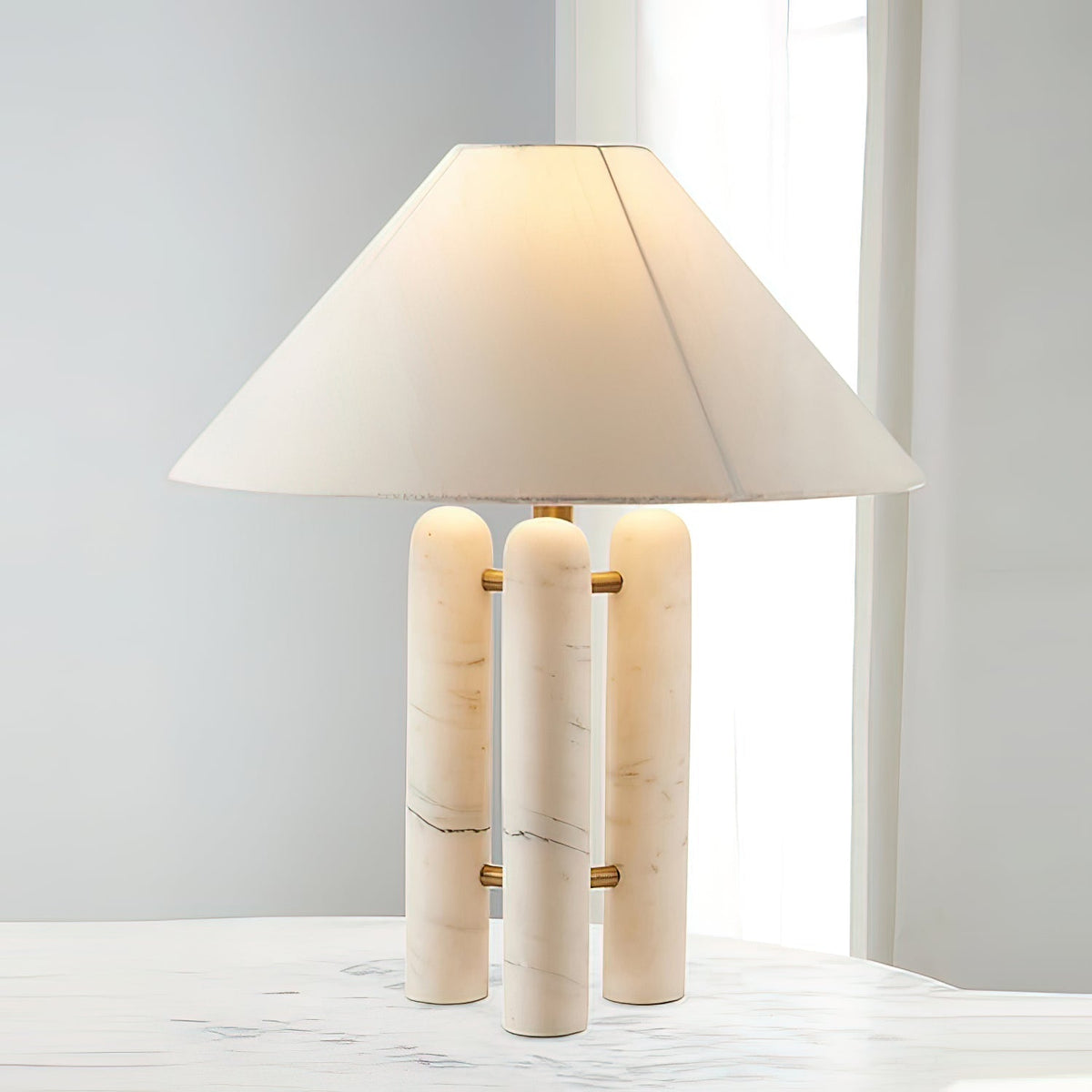 Trio moderne marmorbordlampe