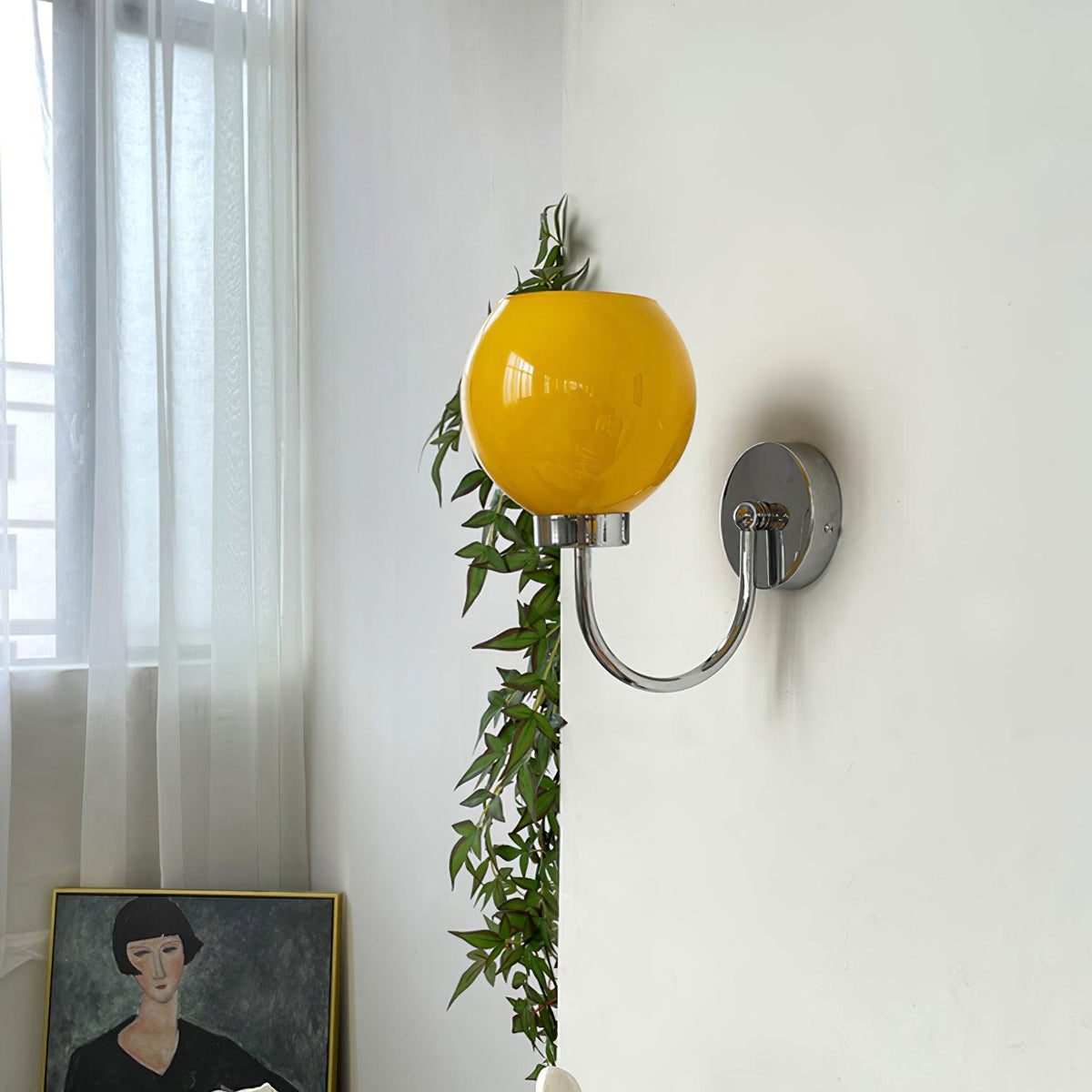 Vostor vägglampa i exklusivt nordiskt konstglas och metall