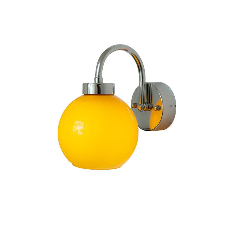 Vostor vägglampa i exklusivt nordiskt konstglas och metall