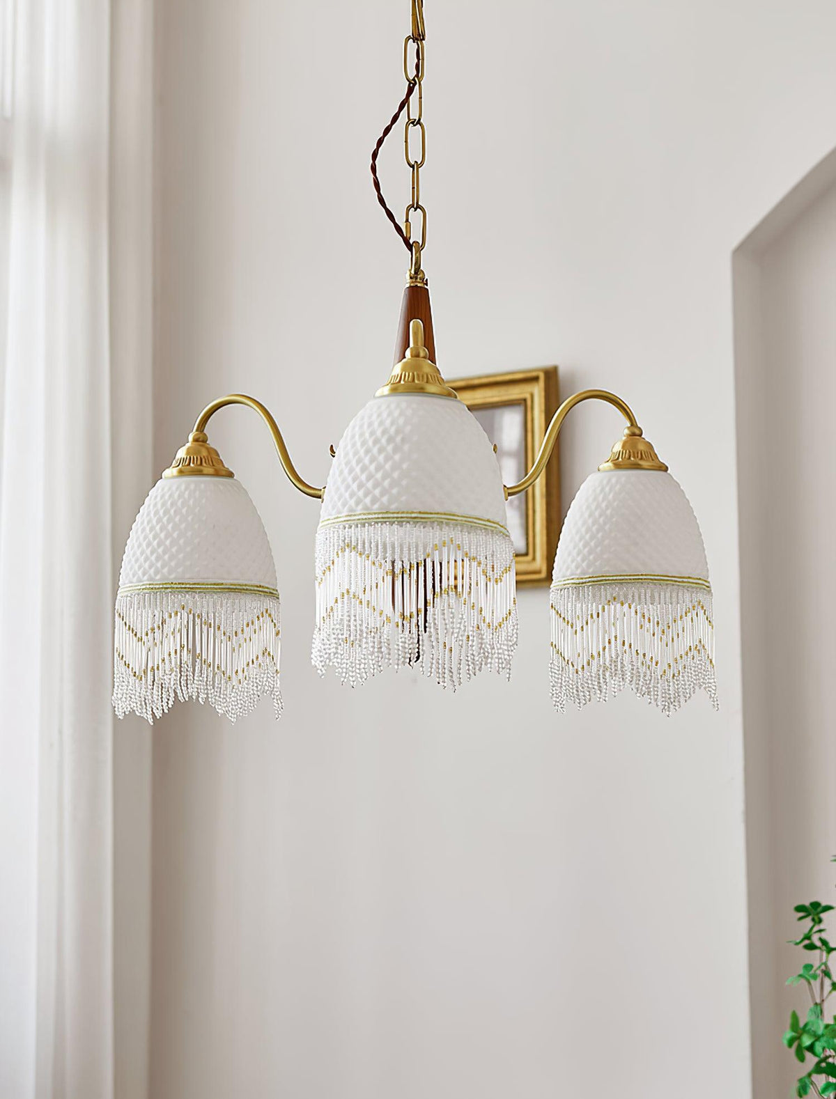 Yaves vintagekrona med tofs och glas