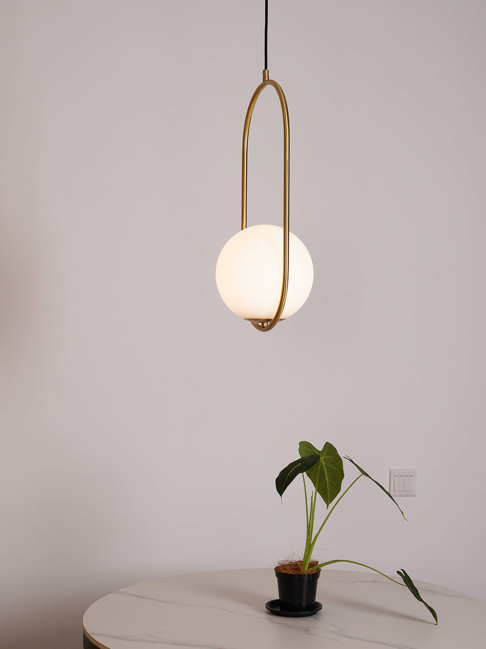 Orieria-messingpendel med moderne ring