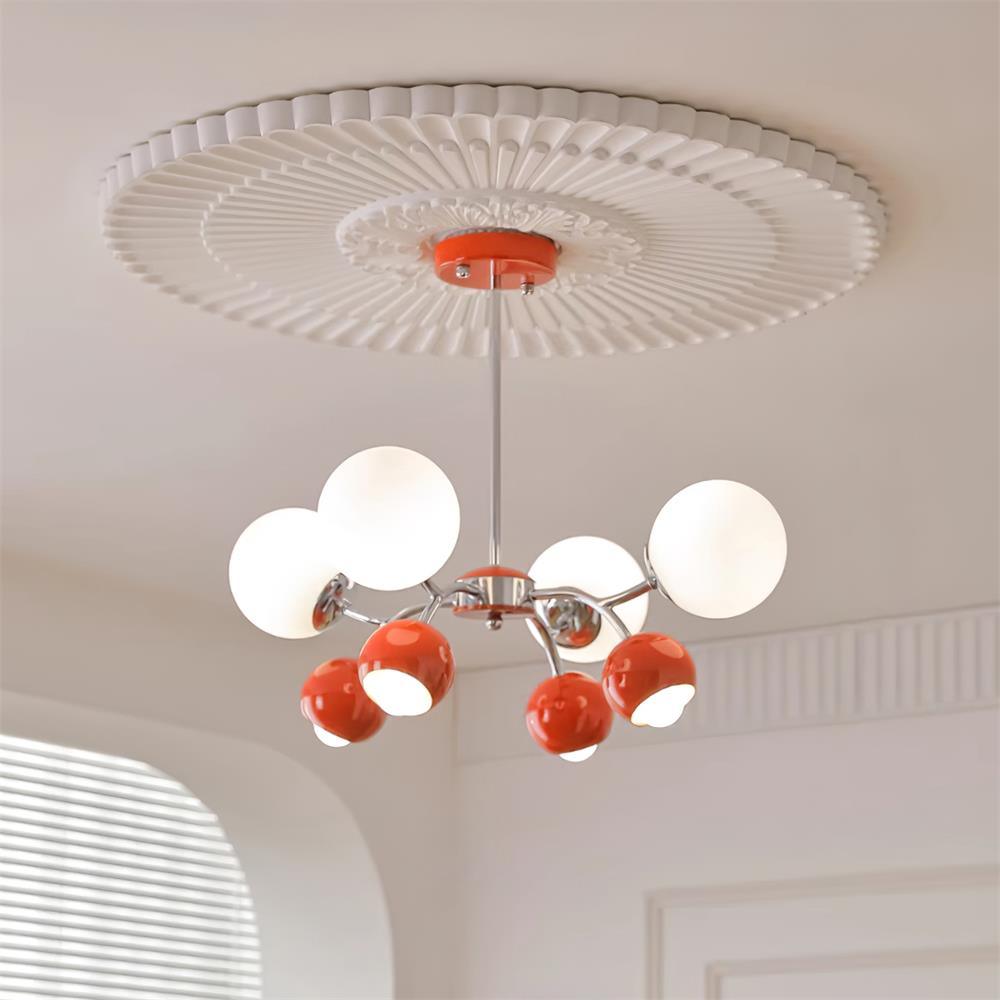 Eloria lysekrone med glaskuppel og kronbladsdesign, minimalistisk stemningsbelysning