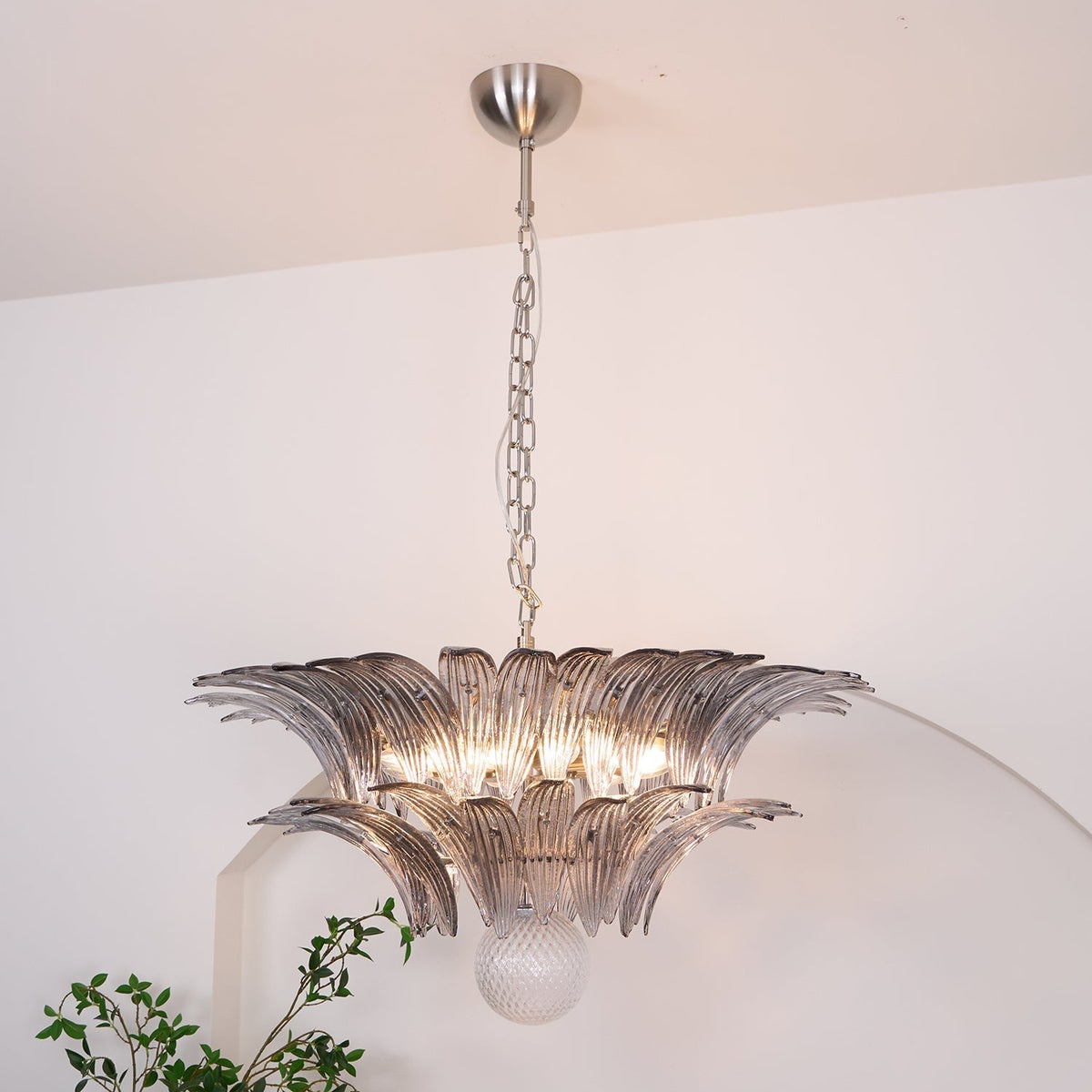 Candelabro Liororira com folha palmeta em vidro Murano transparente, em camadas