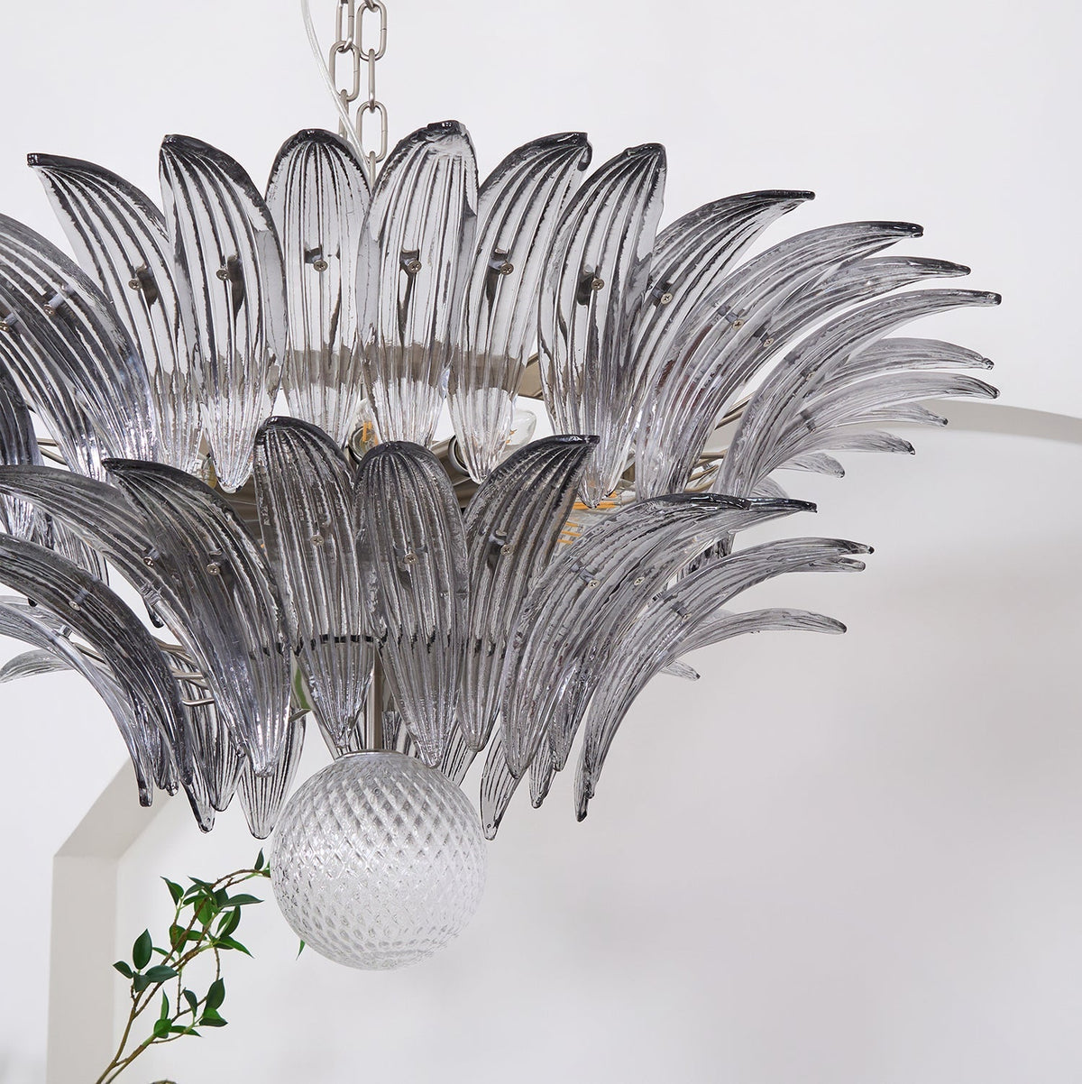Candelabro Liororira com folha palmeta em vidro Murano transparente, em camadas