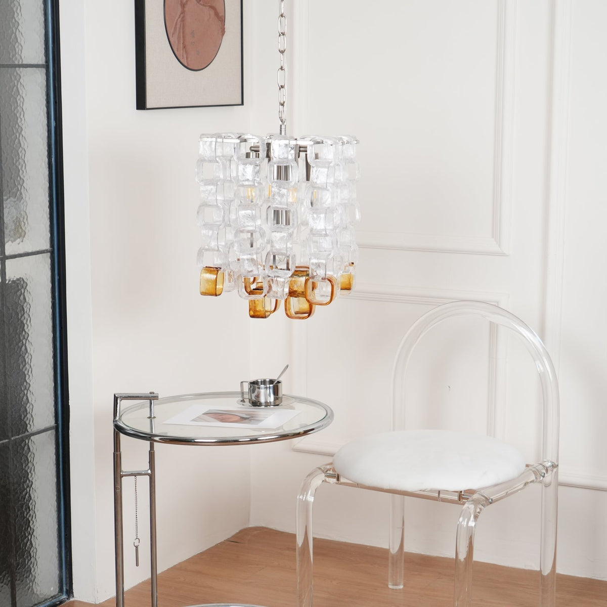 Orielis lysekrone i Murano-glas med sammenflettet geometrisk design