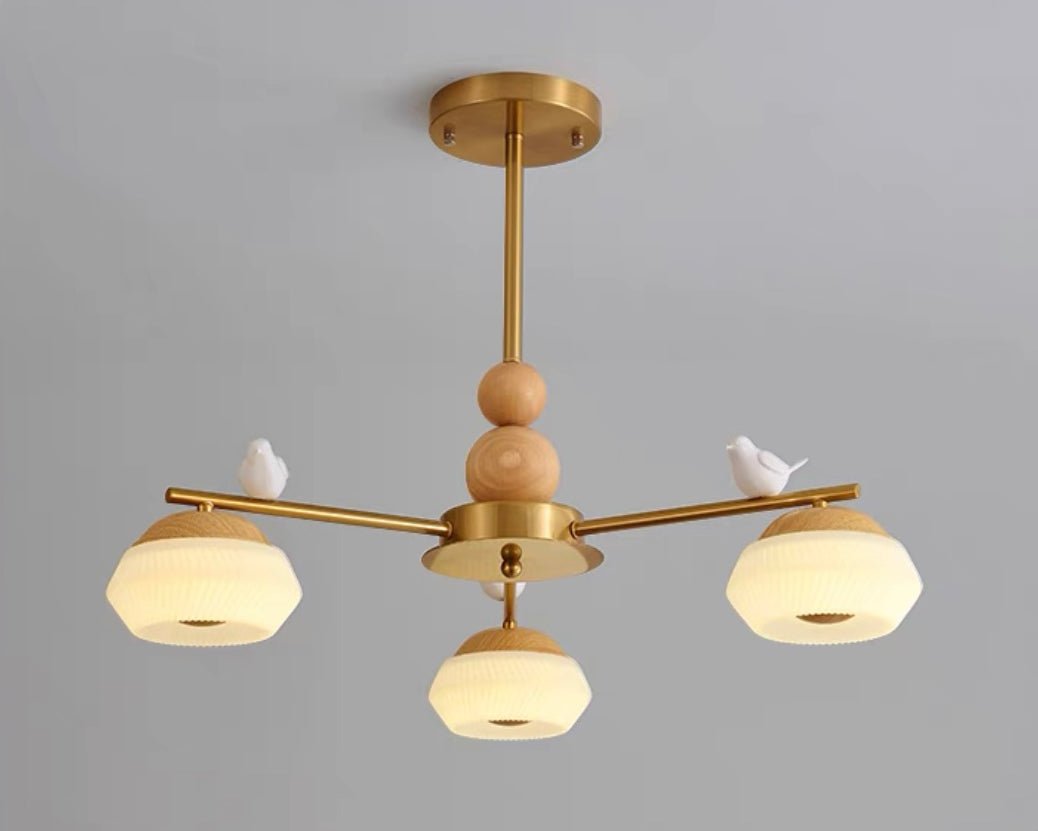 Orieraine mässingskrona med fåglar, elegant Ozawa