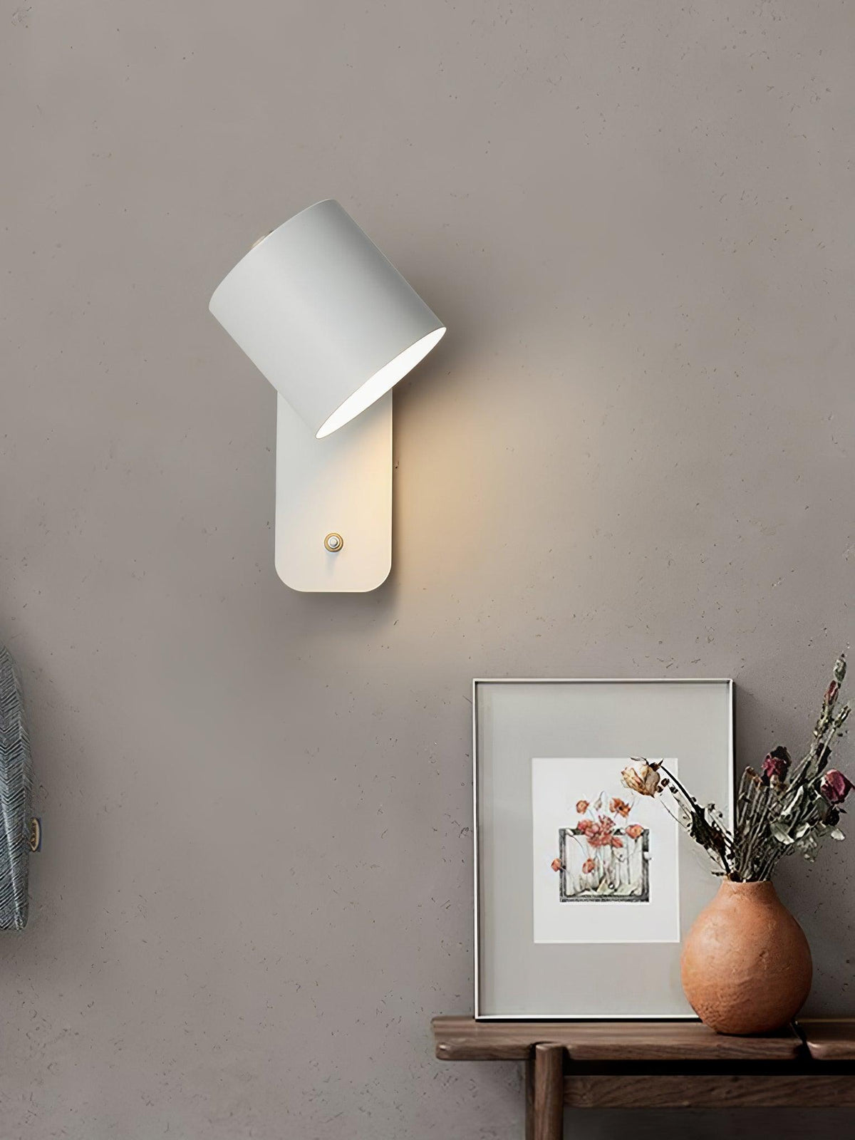 Lumuiella drejelig cylinderformet væglampe