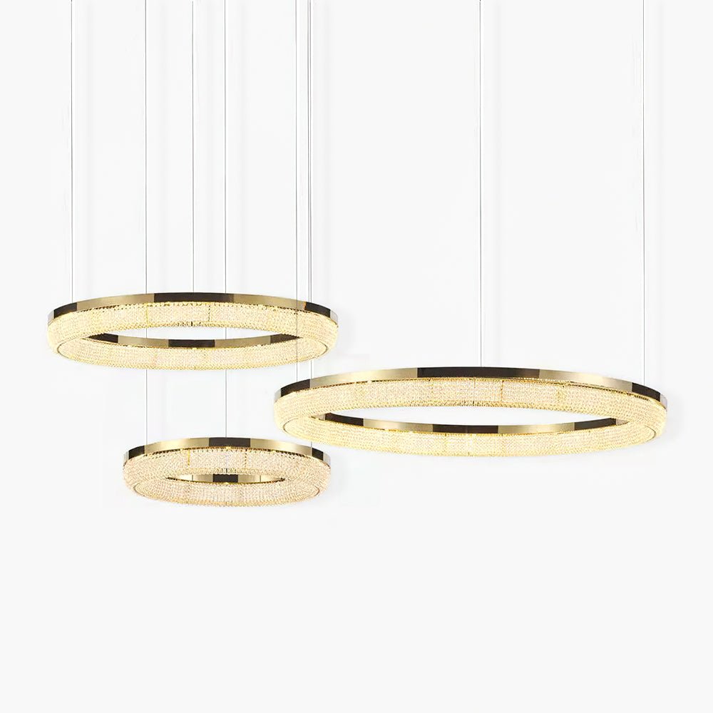 Cyrereon rund kristallampa i guld med LED