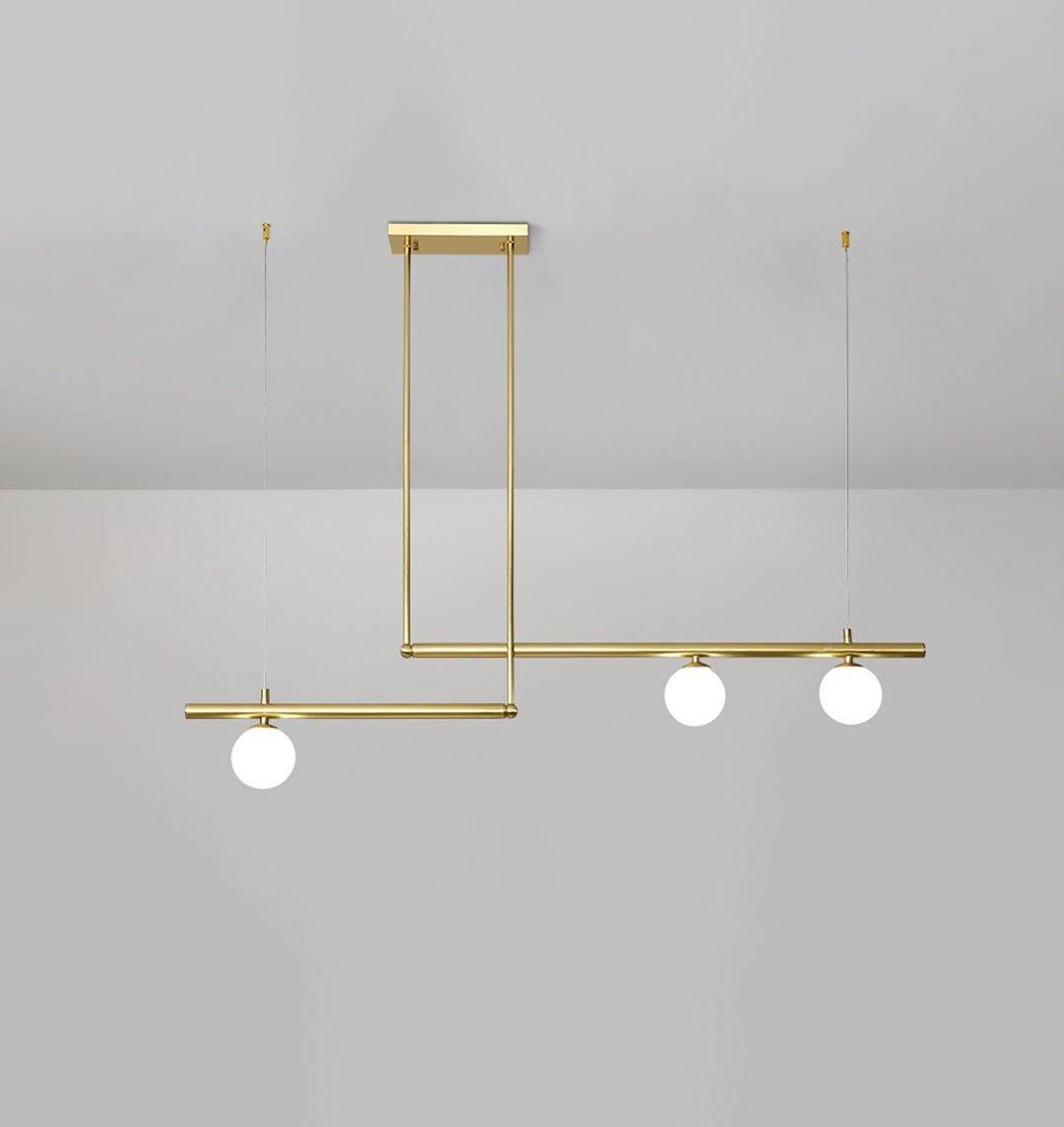 Estix pendellampe i messing, lineær, satellit, minimalistisk