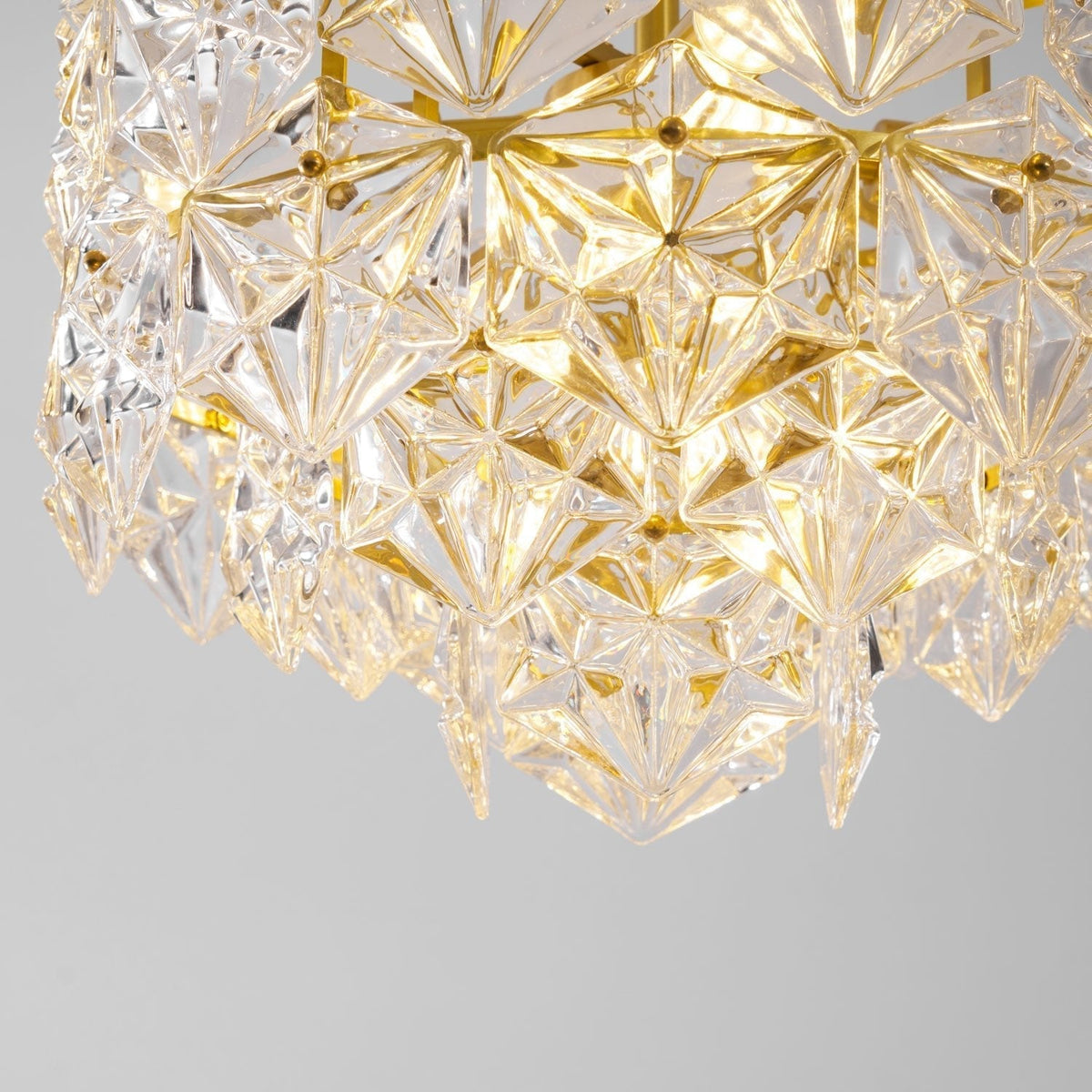 Candeeiro de lustre Eirararia em vidro dourado com flocos de neve
