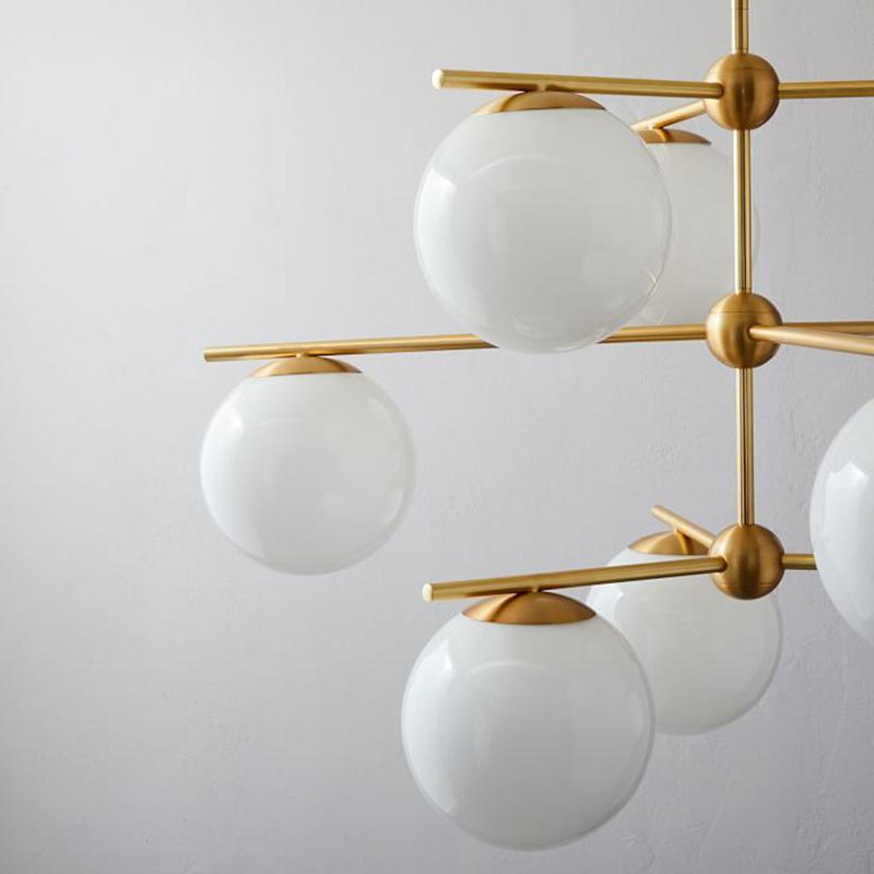 Casoella moderne Sphere & Stem-lysekrone i guldfarve med LED