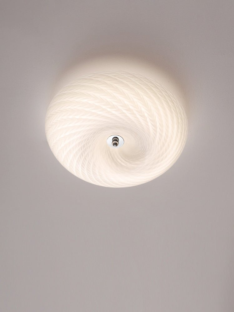 Virvelformad plafond i glas