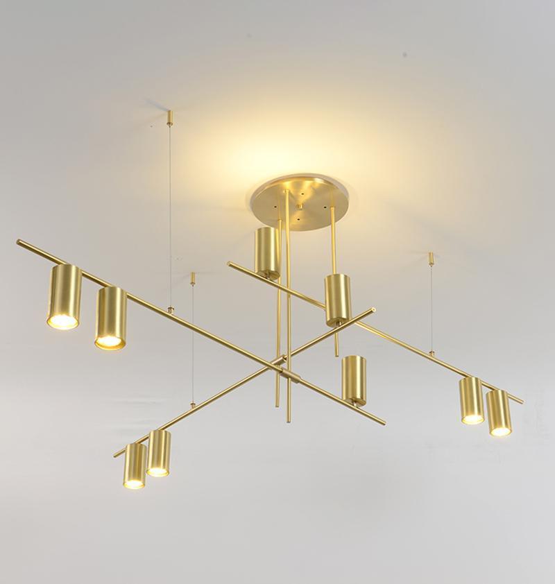 Candeeiro de teto Solenelle, cilindros lineares em latão, estilo tribal