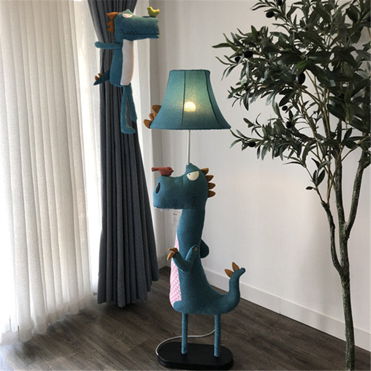Minori moderne gulvlampe i dinosaurdesign, metal/tekstil