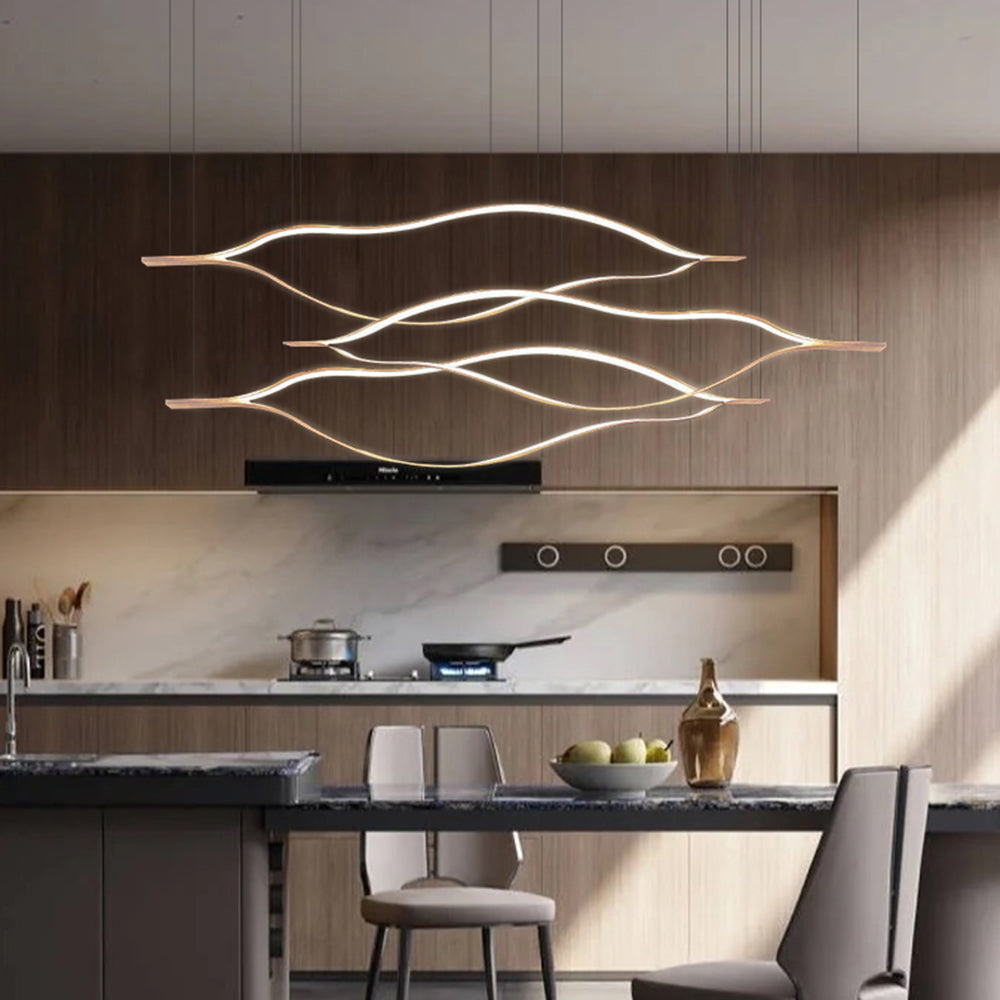 Arisha minimalistisk linjär LED-pendellampa i vågform med gyllene lövform