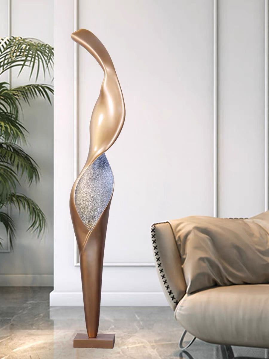 Orelinelle skulpturel gulvlampe i glasfiber