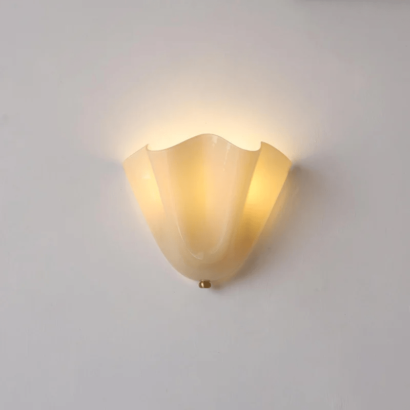 Renenielle vägglampa med mjuka kurvor