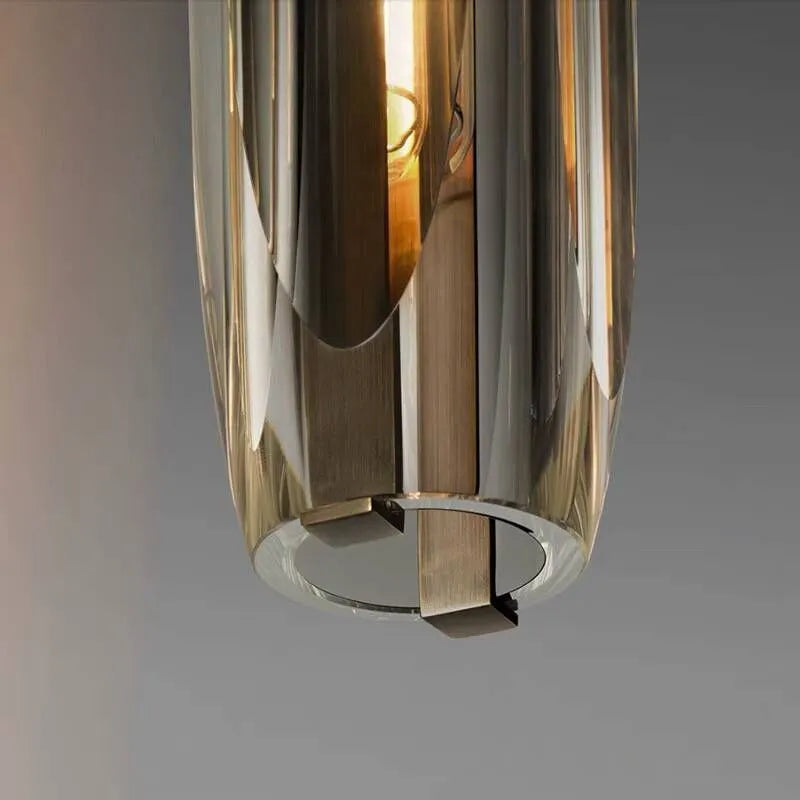 Orinex messinkinen design-lasiriippuvalaisin, savunharmaa