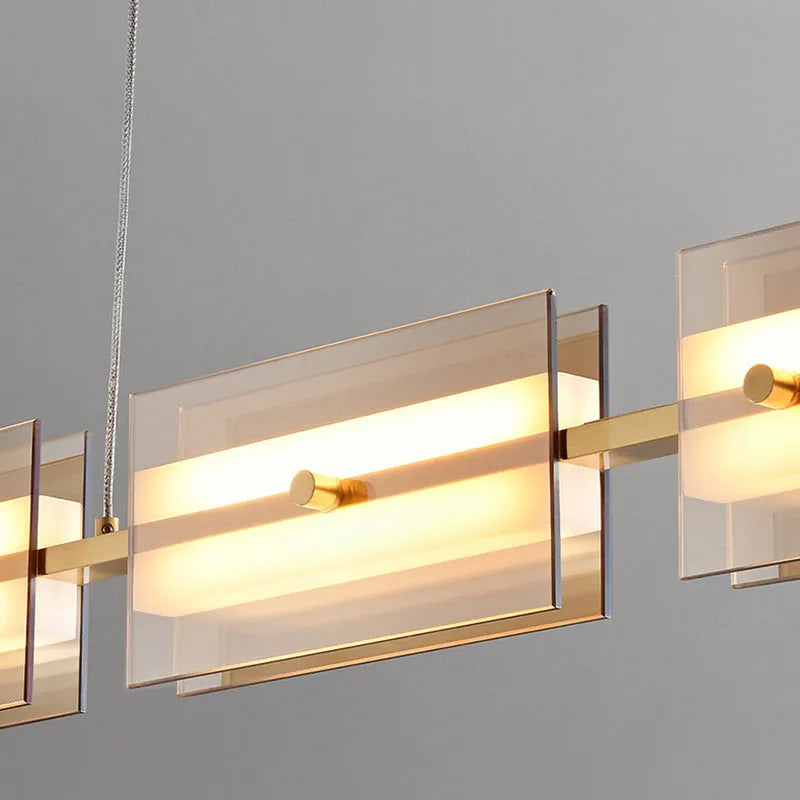 Arisha modern nordisk linjär pendellampa i metall/glas, mässing/svart