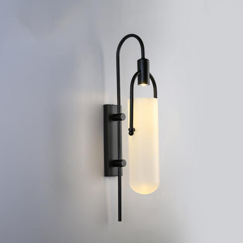 Liororaya væglampe med buet moderne glas