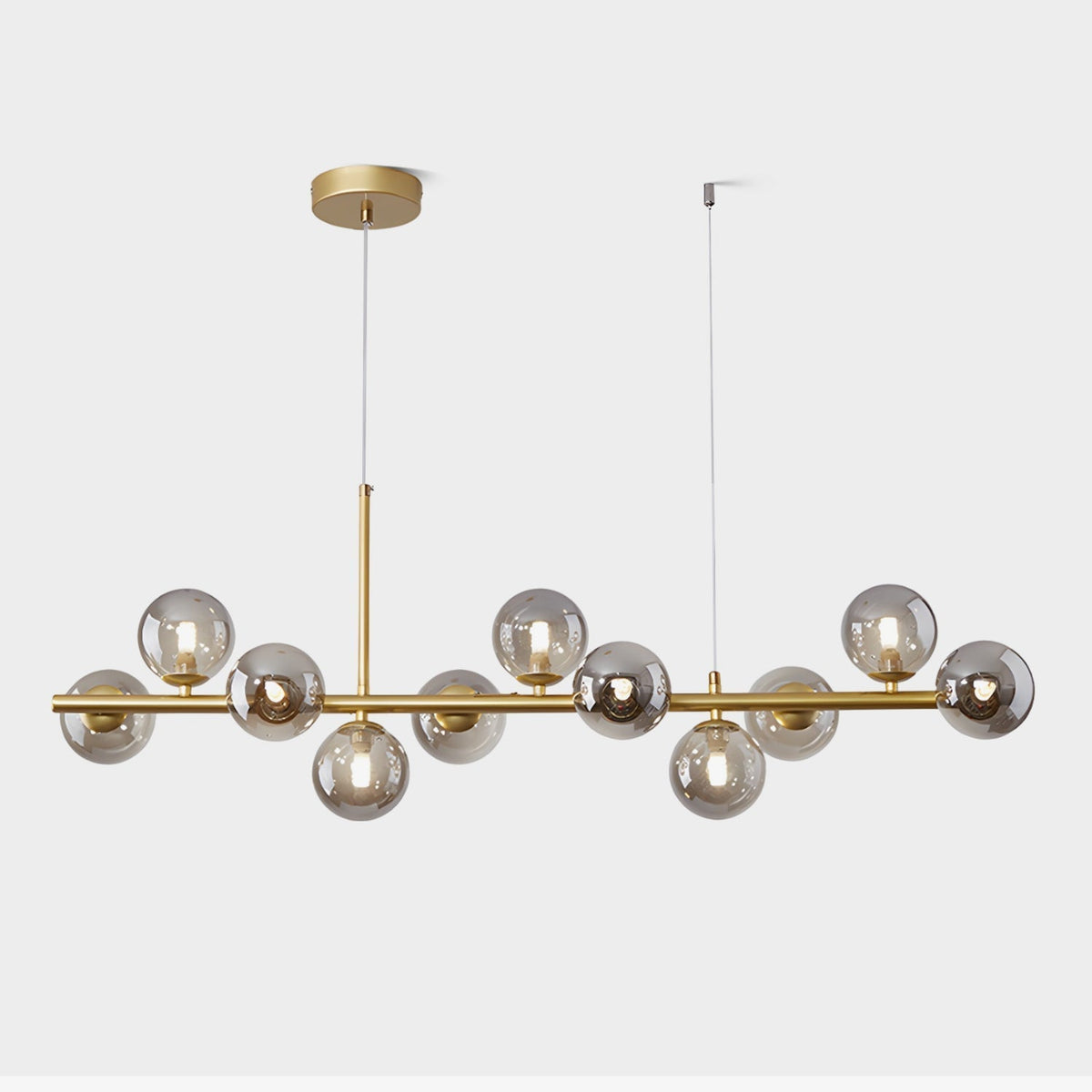Candeeiro de teto Lioroora, em vidro e forma de globo dourado, com 12 luzes