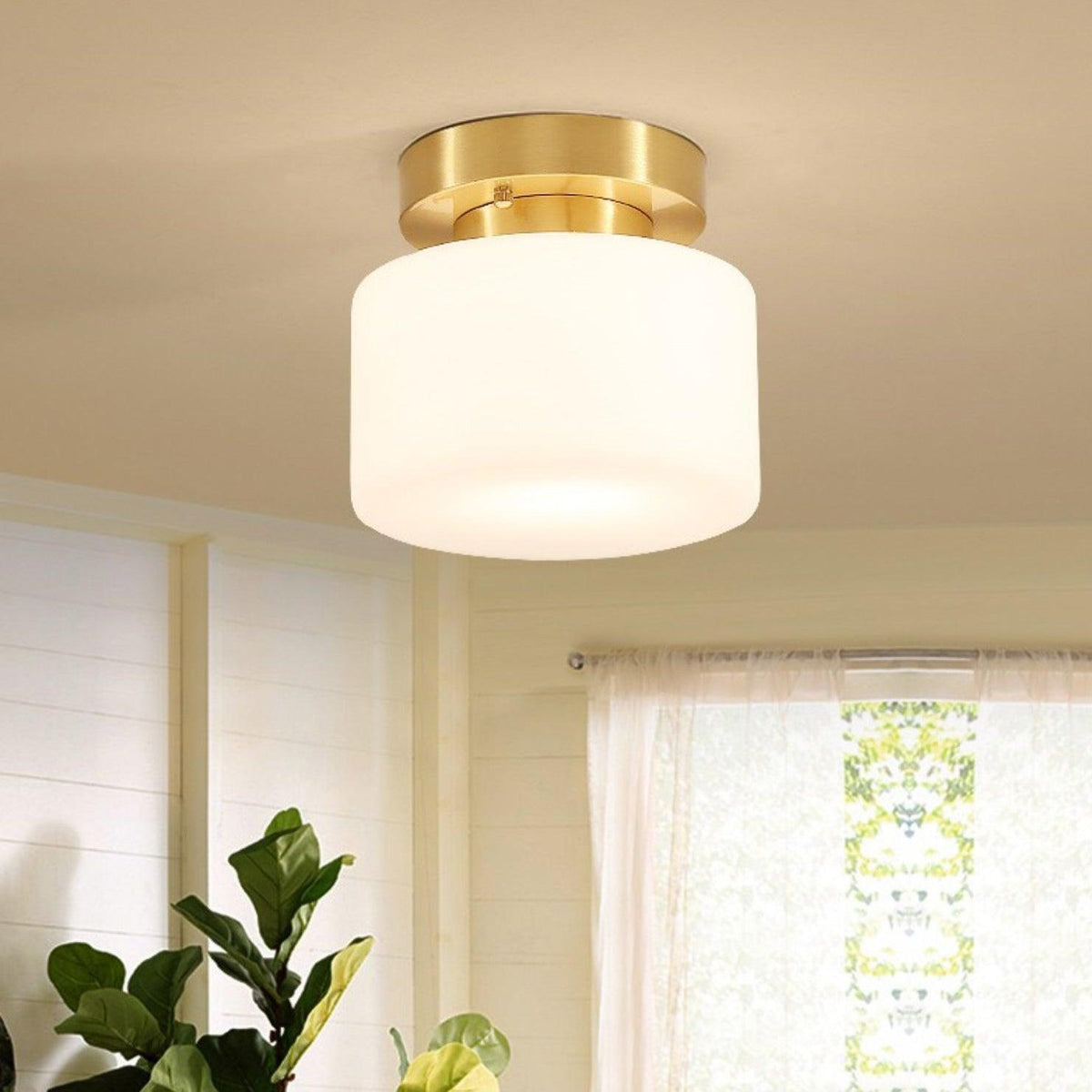 Elsilisra nordisk kunstnerisk loftslampe i messing og glas