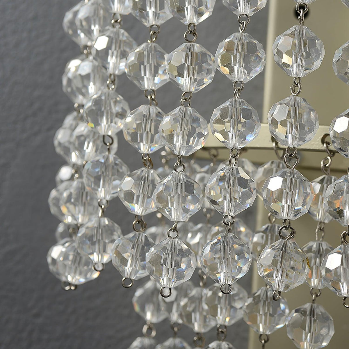 Cyranise vägglampa med kristallvattenfall