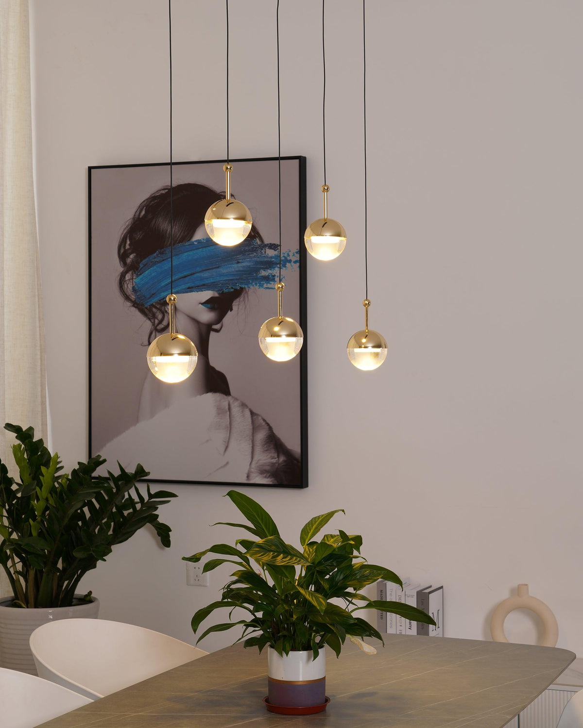 Zaneth minimalistisk pendellampe i stål og glas med flere ophæng til trappe